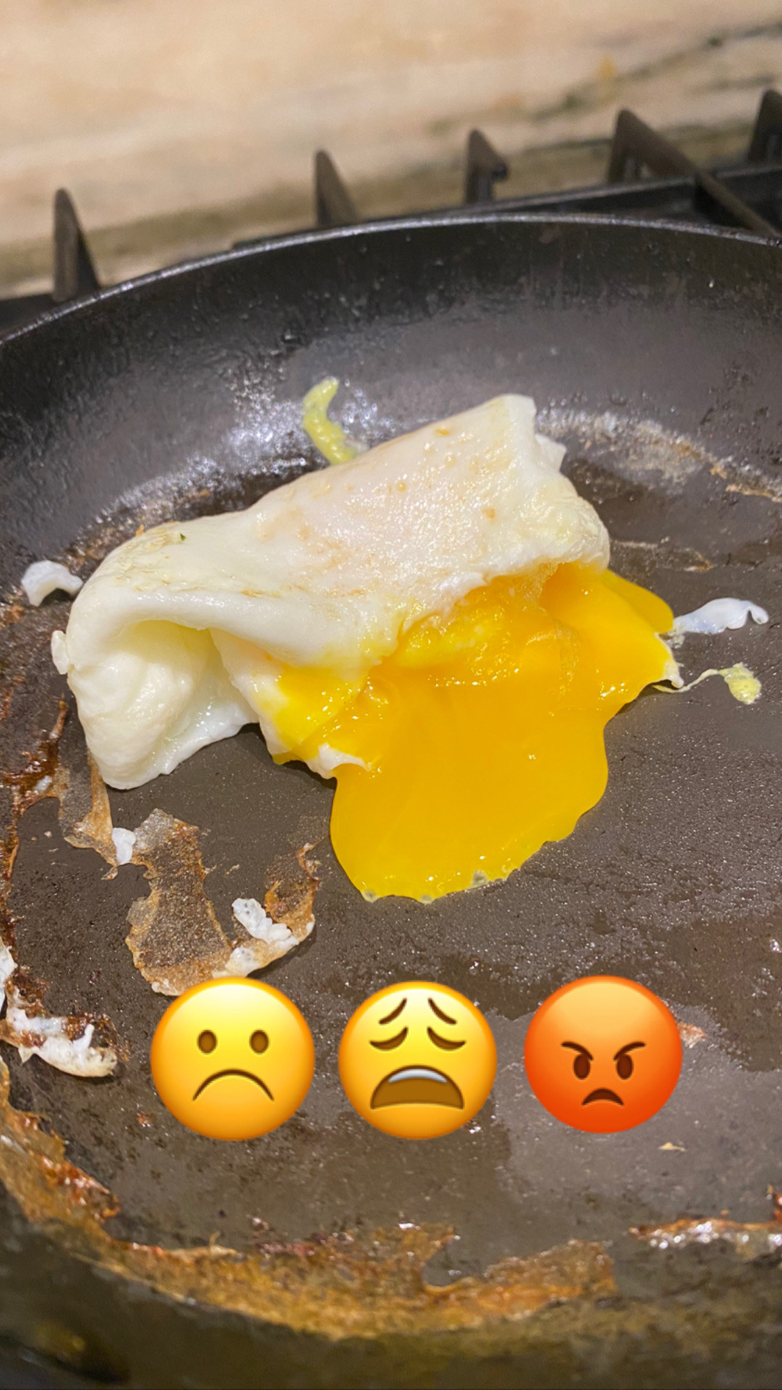 My failed attempt to make an egg envelope with yolk dribbling out onto the pan.