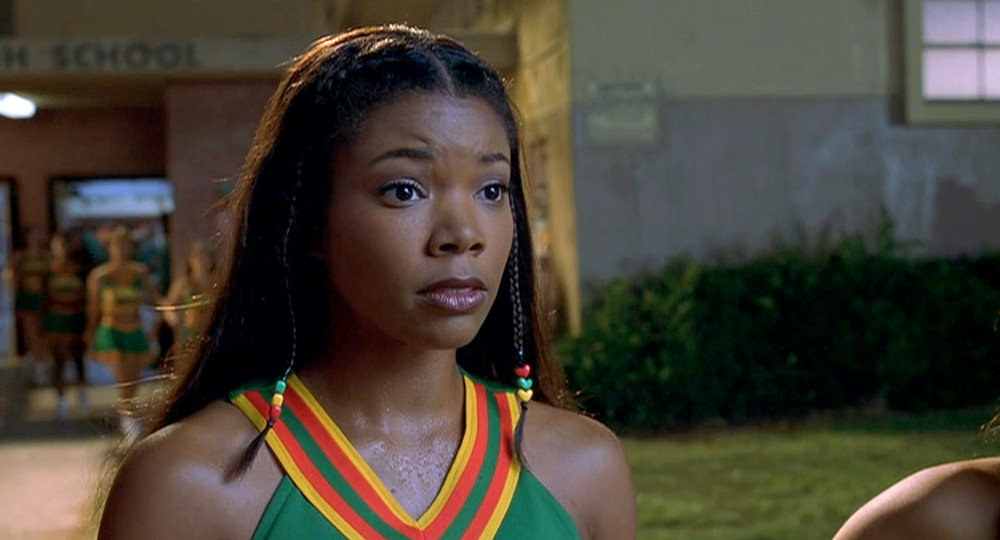 Isis confronting Torrance outside of Clover High.