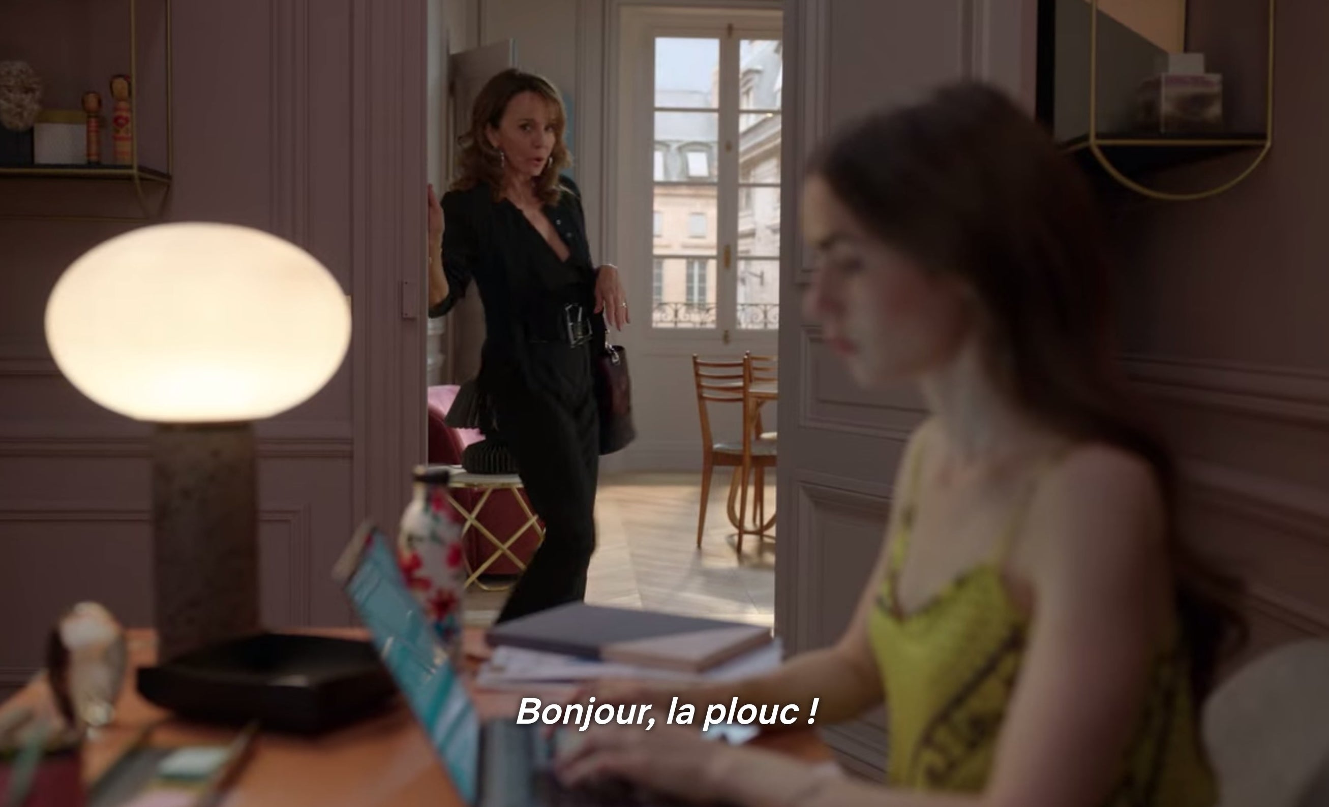 Emily being greeted at her new job with &quot;Bonjour, la plouc!&quot;