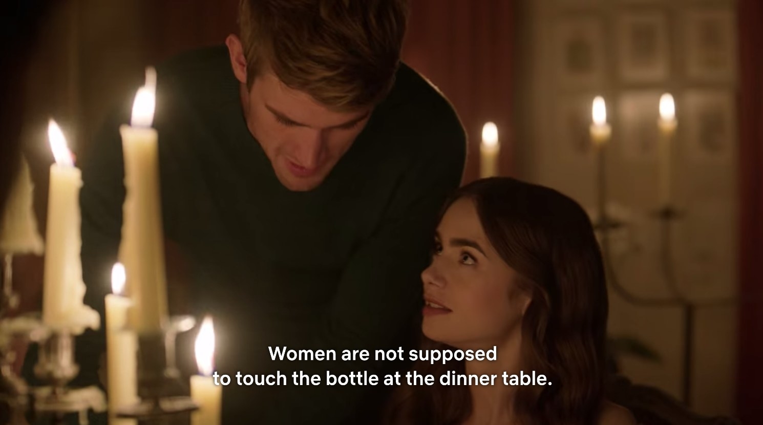 Emily being told &quot;Women are not supposed to touch the bottle at the dinner table.&quot;