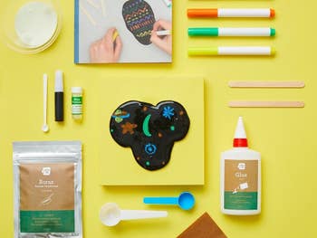 the kit with everything it includes from glue, to the slime, to markers, and more