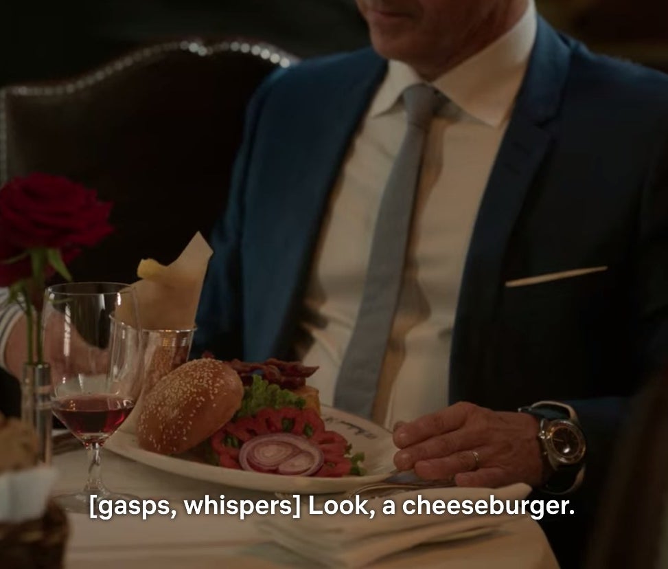 A cheeseburger being served at Ralph Lauren&#x27;s restaurant on &quot;Emily in Paris&quot;.