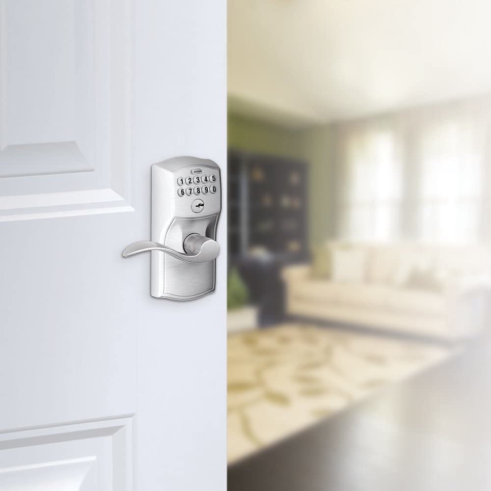 A close up of the keypad lock on a front door