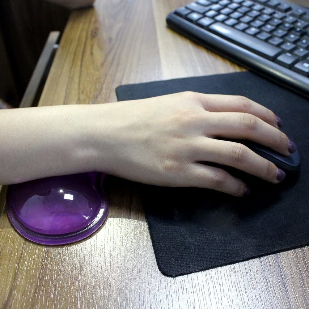 A person with their wrist on a jelly wrist rest