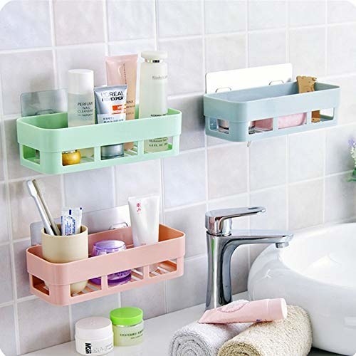 Pastel bathroom organisers above a bathroom sink.