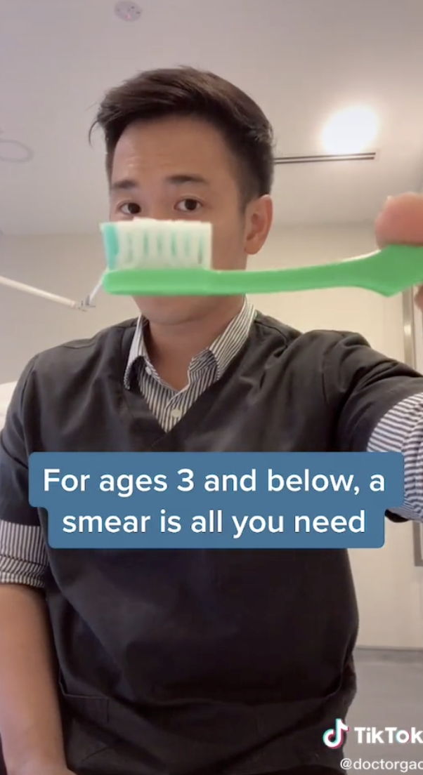 Photo of Dr. Gao holding a toothbrush from his TikTok.