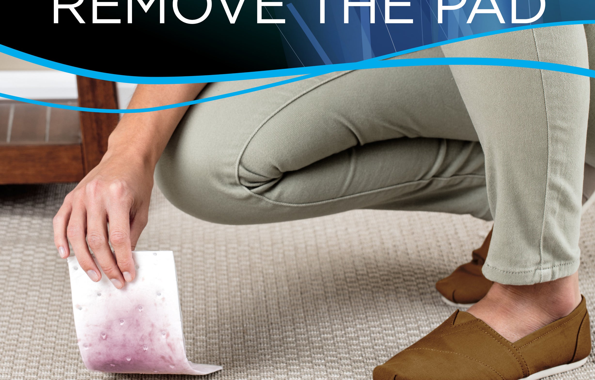 The pad, being removed from the carpet after lifting the stain