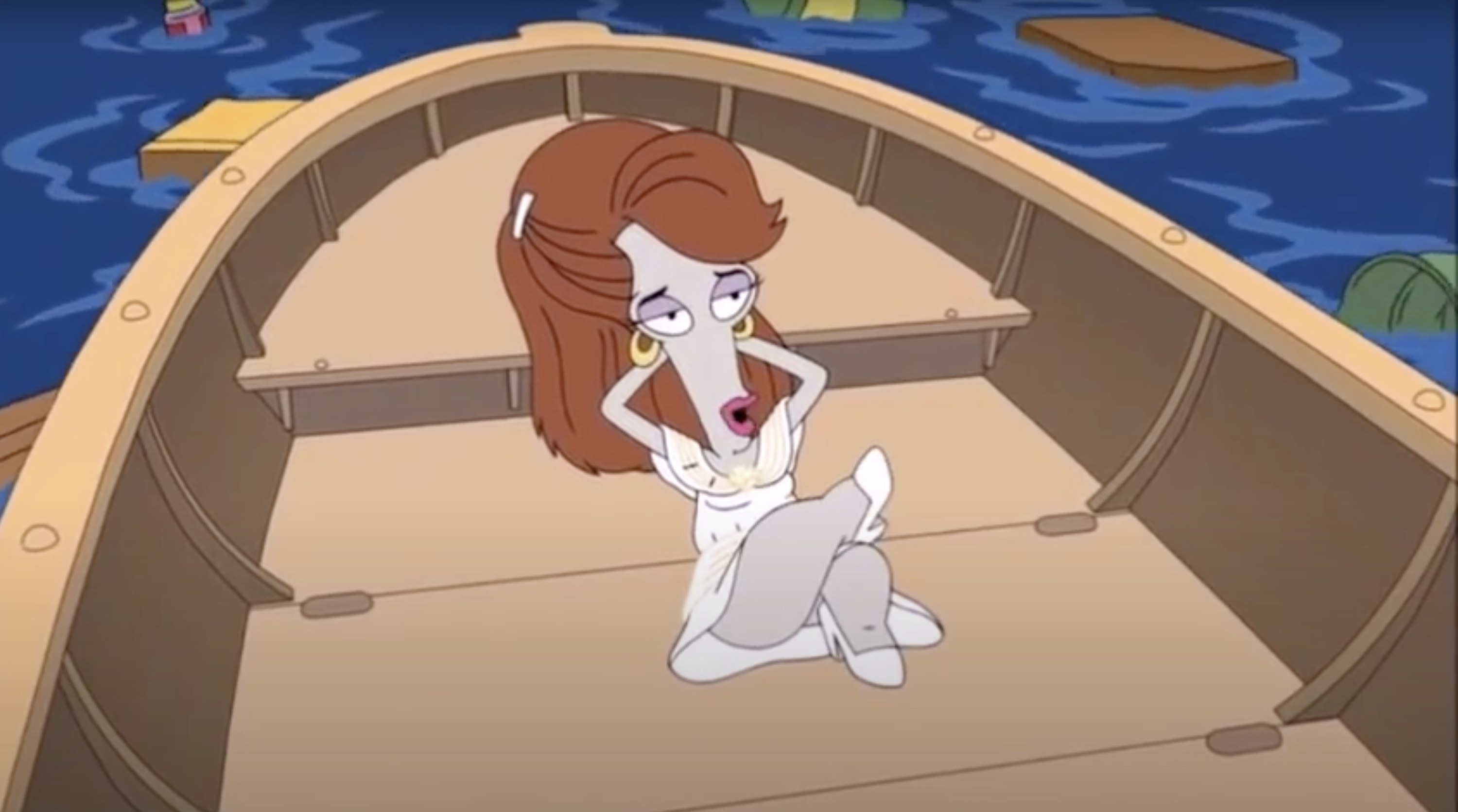 Roger dressed as lady relaxing in boat