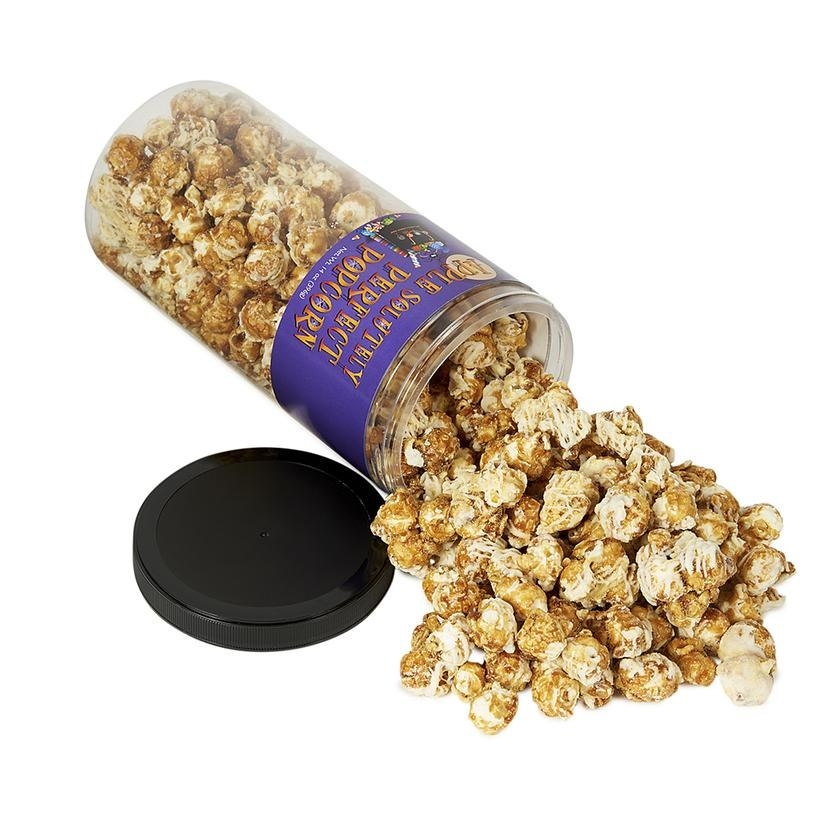 The popcorn spilled out of the container