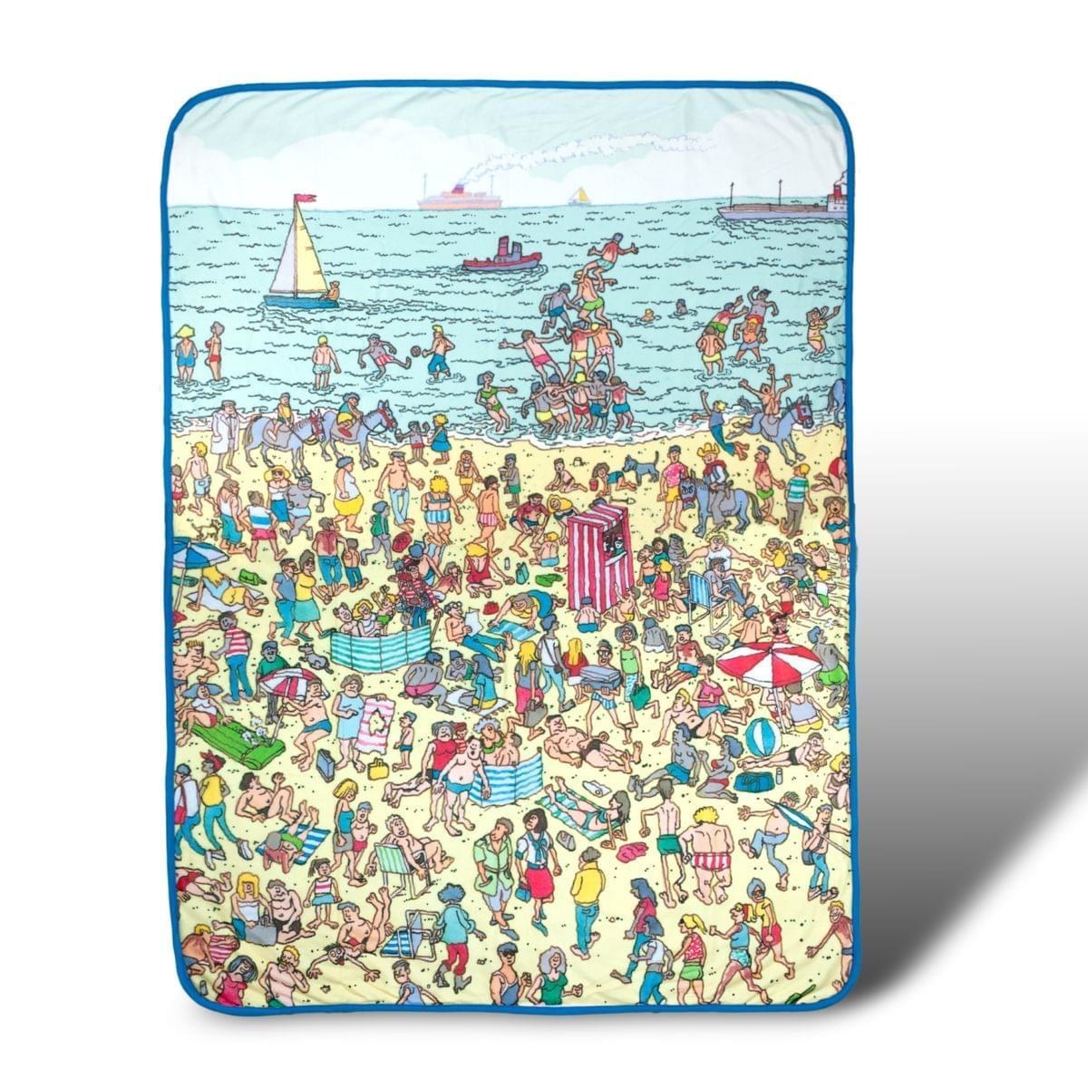 The blanket with a beach-themed Where's Waldo scene