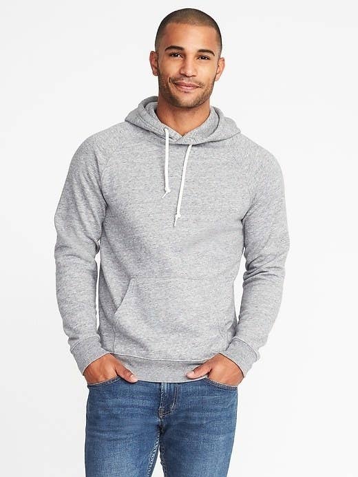 Model wearing the hoodie with blue jeans