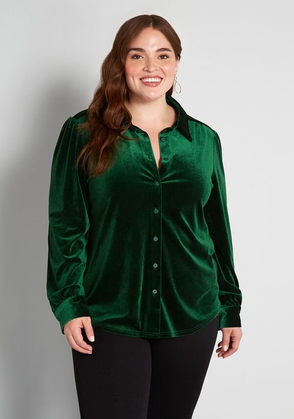 A model wearing the long-sleeved shirt with slightly puffed shoulders