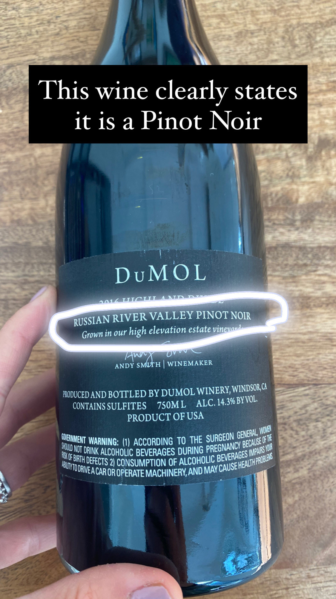 The back of a Dumol wine label, showing where the wine is grown and the variety.