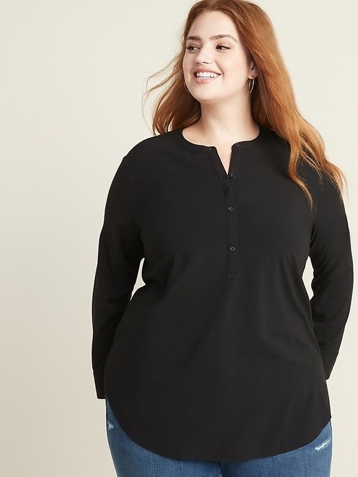 Model wearing the long-sleeve top in black