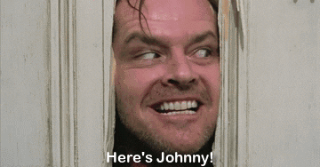 Jack Torrance from &quot;The Shining&quot; cutting through a wooden door, screaming: &quot;Here&#x27;s Johnny!&quot;