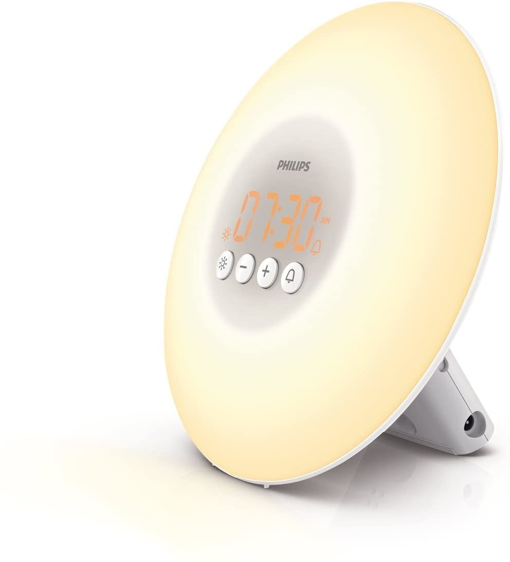 the alarm clock with a circular light on it 