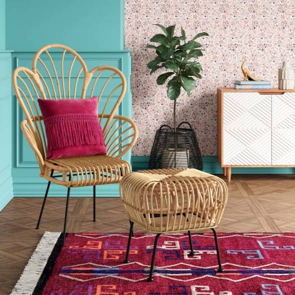 Fan back chair with stool and pink rug