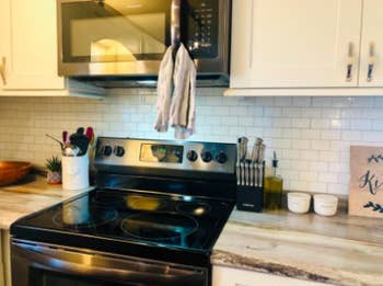 reviewer pic of the tile in a kitchen