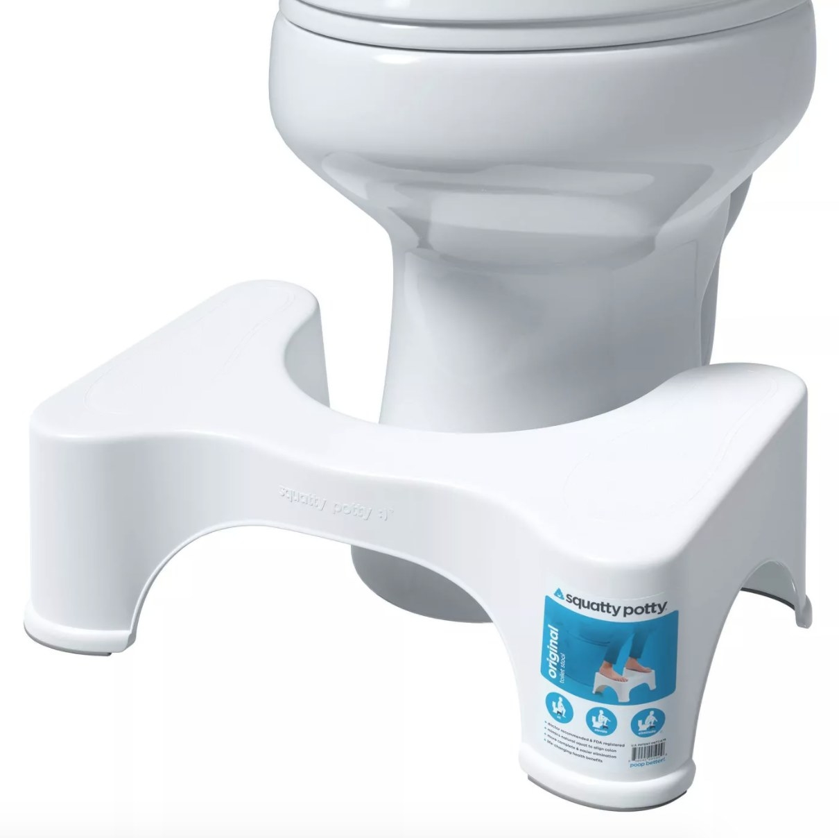 A white plastic Squatty Potty that lifts up your feet as you sit on the toilet