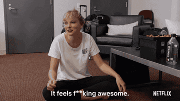 GIF of Taylor with a caption saying, &quot;It feels f**king awesome.&quot;