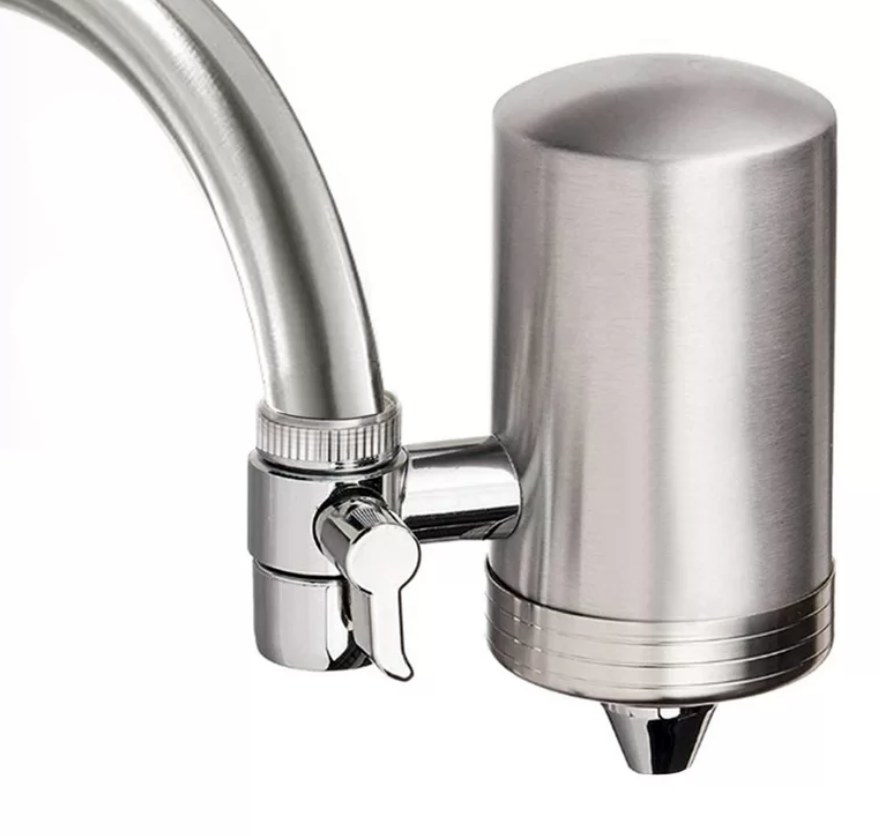 Silver cylinder filtration system attached to faucet head