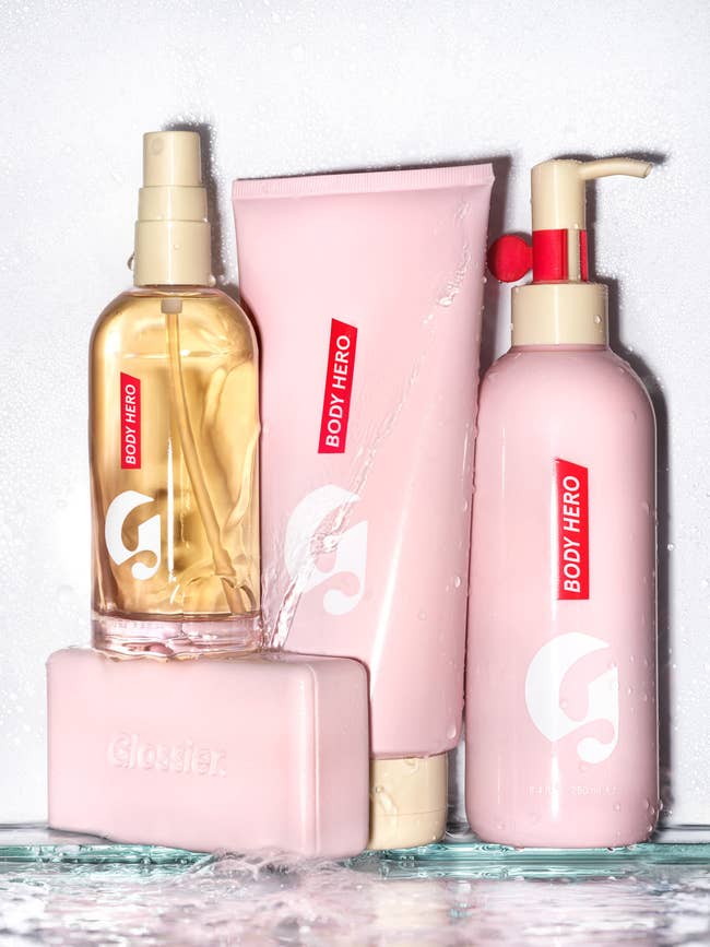 All four of the body products that are included in the set in their pink packaging