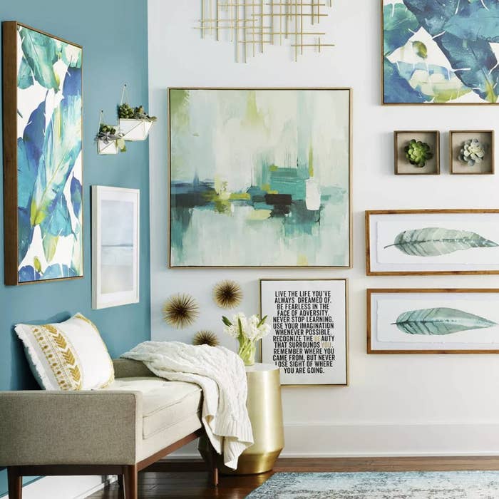 Three sea urchin wall decor on a gallery wall in a living space