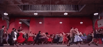 The cast of &quot;West Side Story&quot; dances in sync during a musical number.