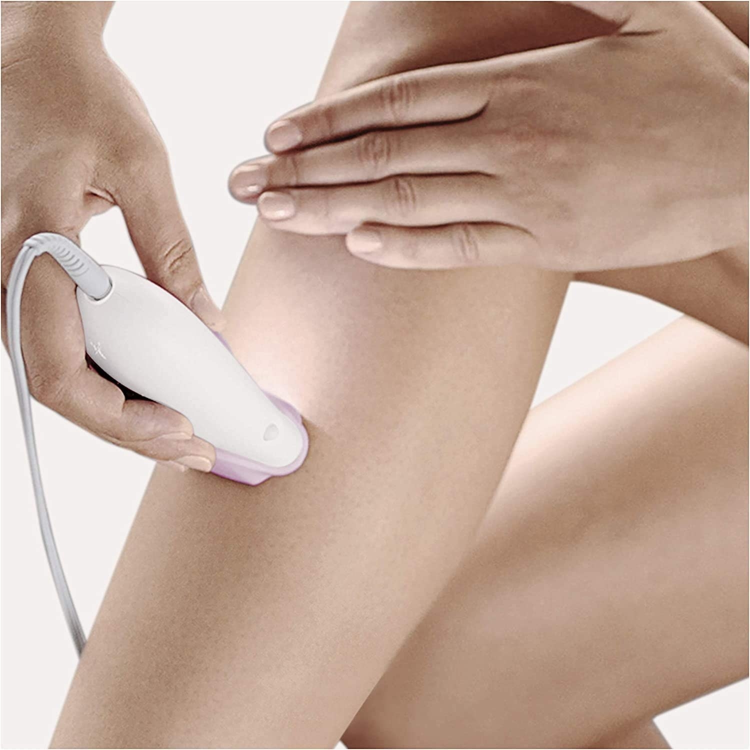A model using the epilator on their legs