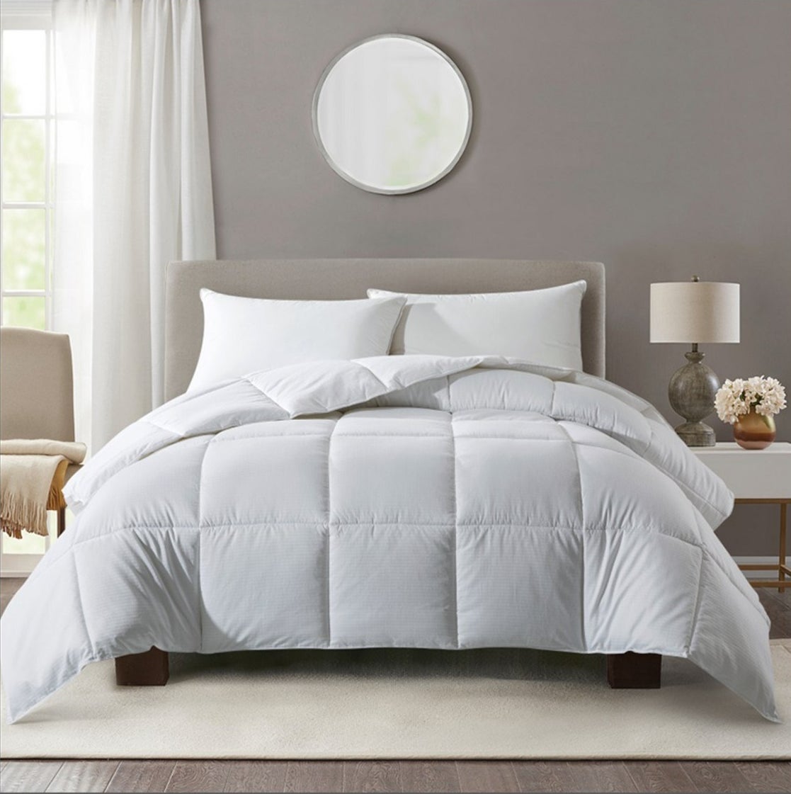 White box design duvet on a bed 