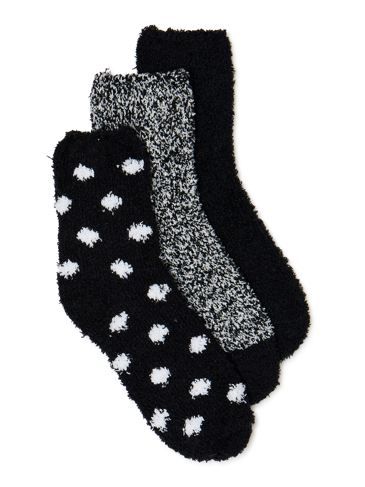 Three pairs of fuzzy black and white socks