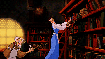 belle from beauty and the beast sliding on a rolling library ladder while singing