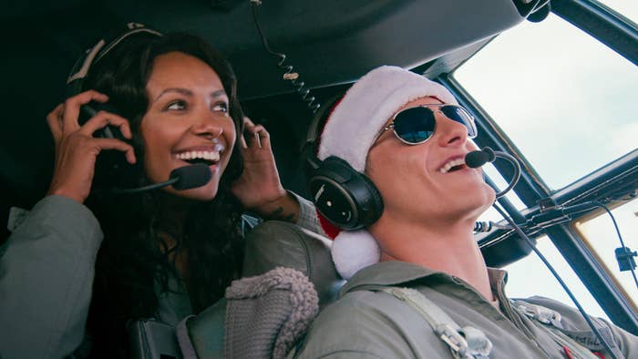 Andrew Jantz and Erica Miller flying in an army plane. 