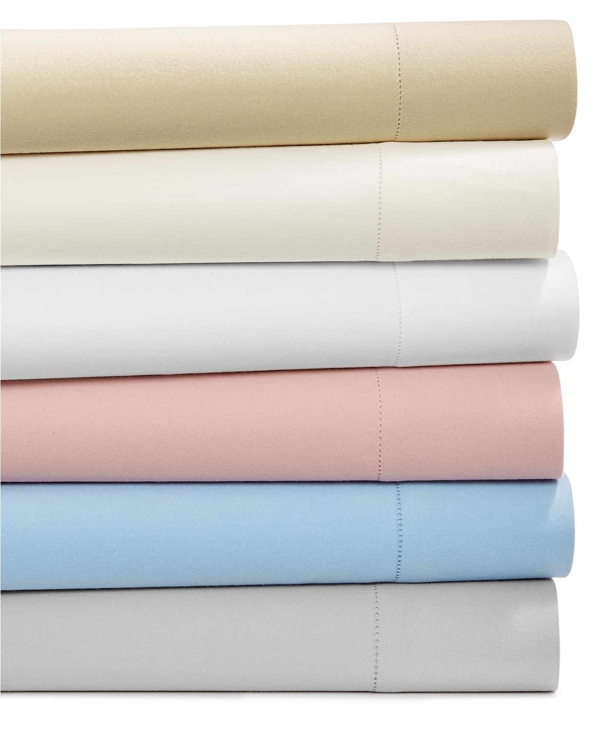 Sheets in different muted pastels stacked on top of each other 