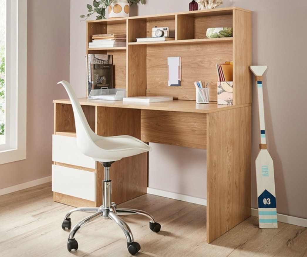 Wooden hutch displaying trinkets and books with desk chair 