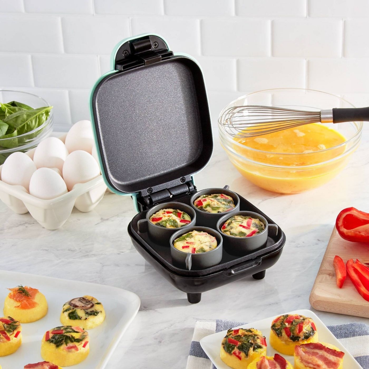 The mini egg maker with space to cook four eggs