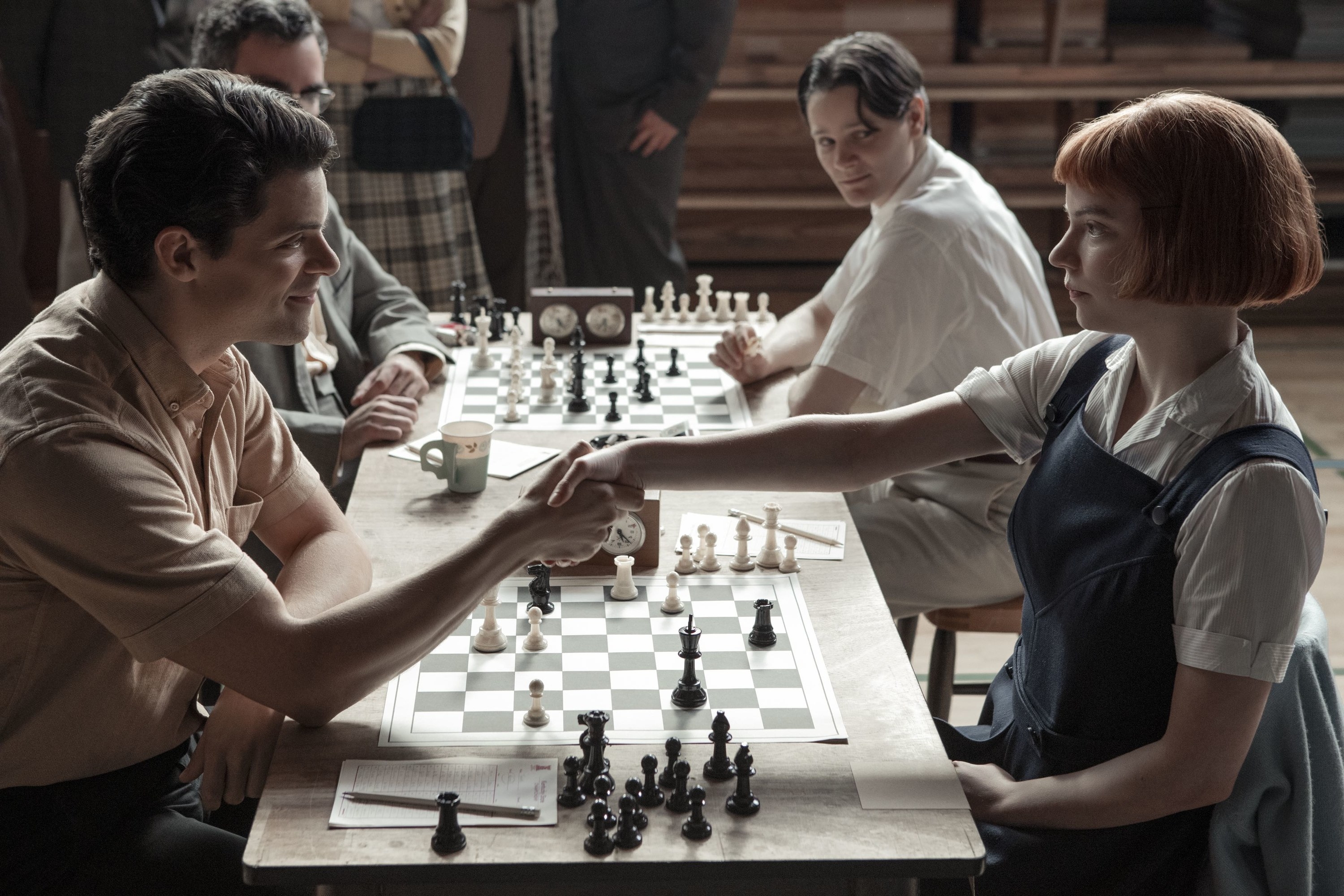 Beth shaking the hand of an opponent