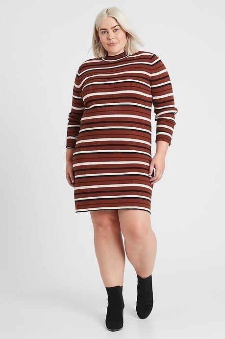 Model wearing brown/white/brown striped dress
