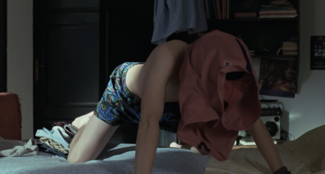 Timothée Chalamet dry-humping the air while wearing a pair of Oliver&#x27;s red shorts over his head in &quot;Call Me by Your Name&quot;