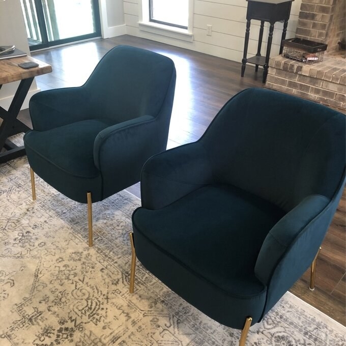 Reviewer&#x27;s green velvet armchairs with gold chairs 