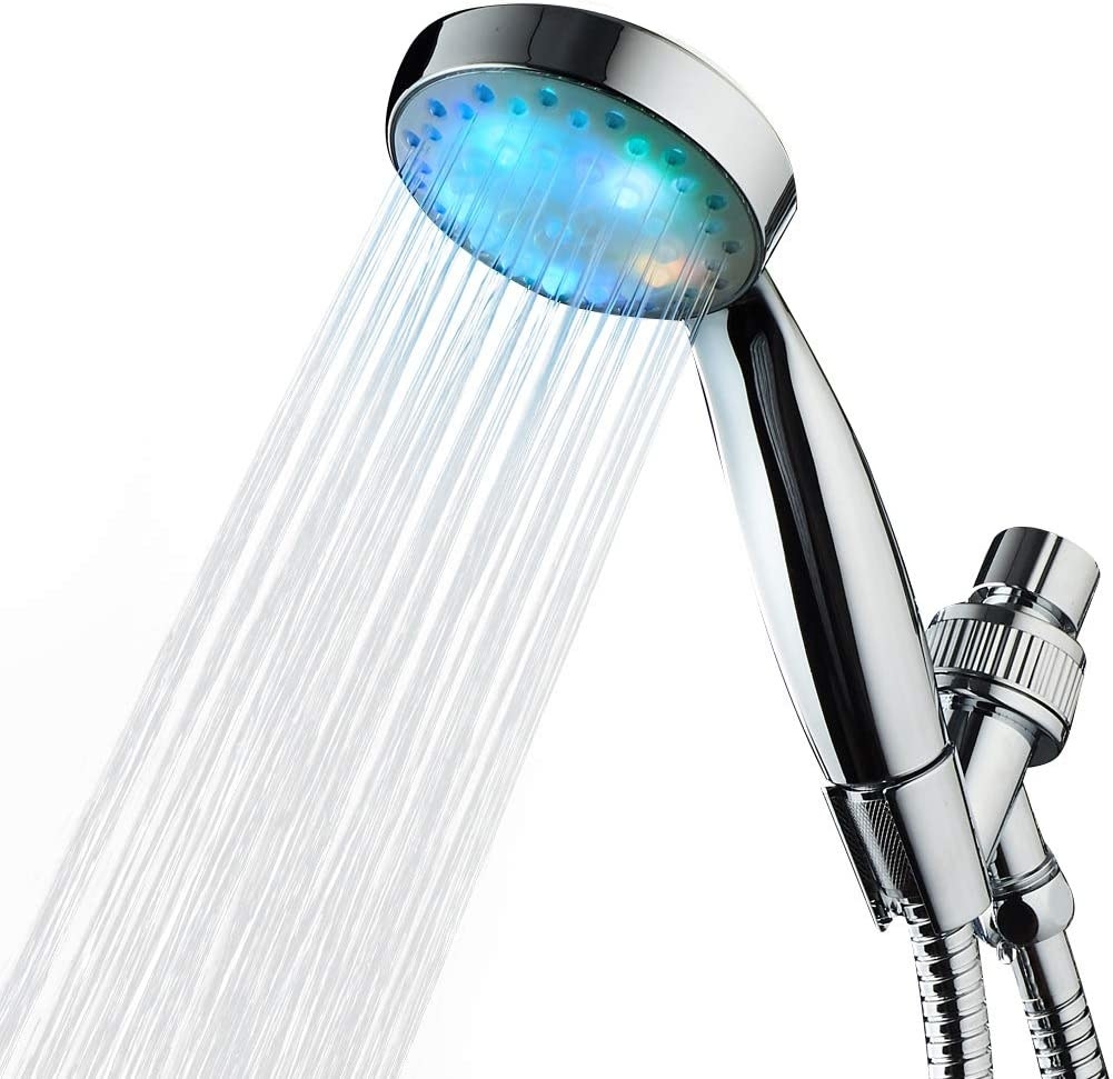 Silver LED light up shower head shooting water