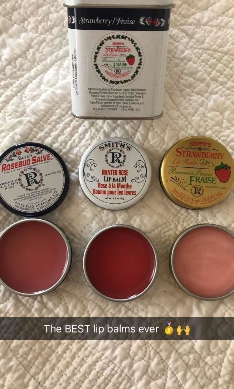 Three open tins of Rosebud Salve with a caption that reads &quot;The BEST lip balms ever&quot; 