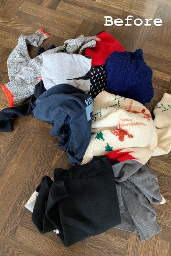 A photo of a pile of sweaters with a caption that reads 
