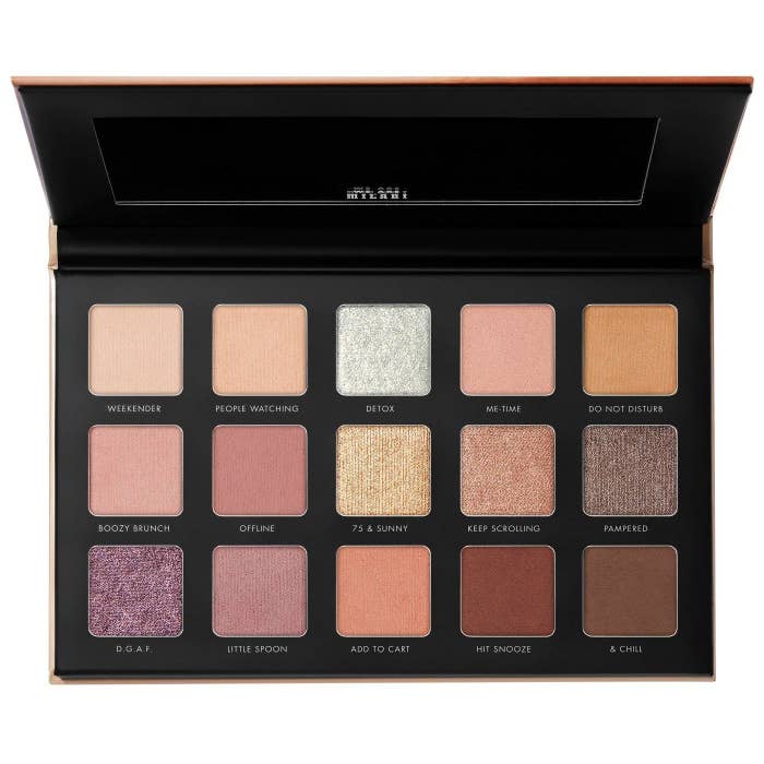 milani eyeshadow palette with 15 shades in pink, brown, purple, etc.