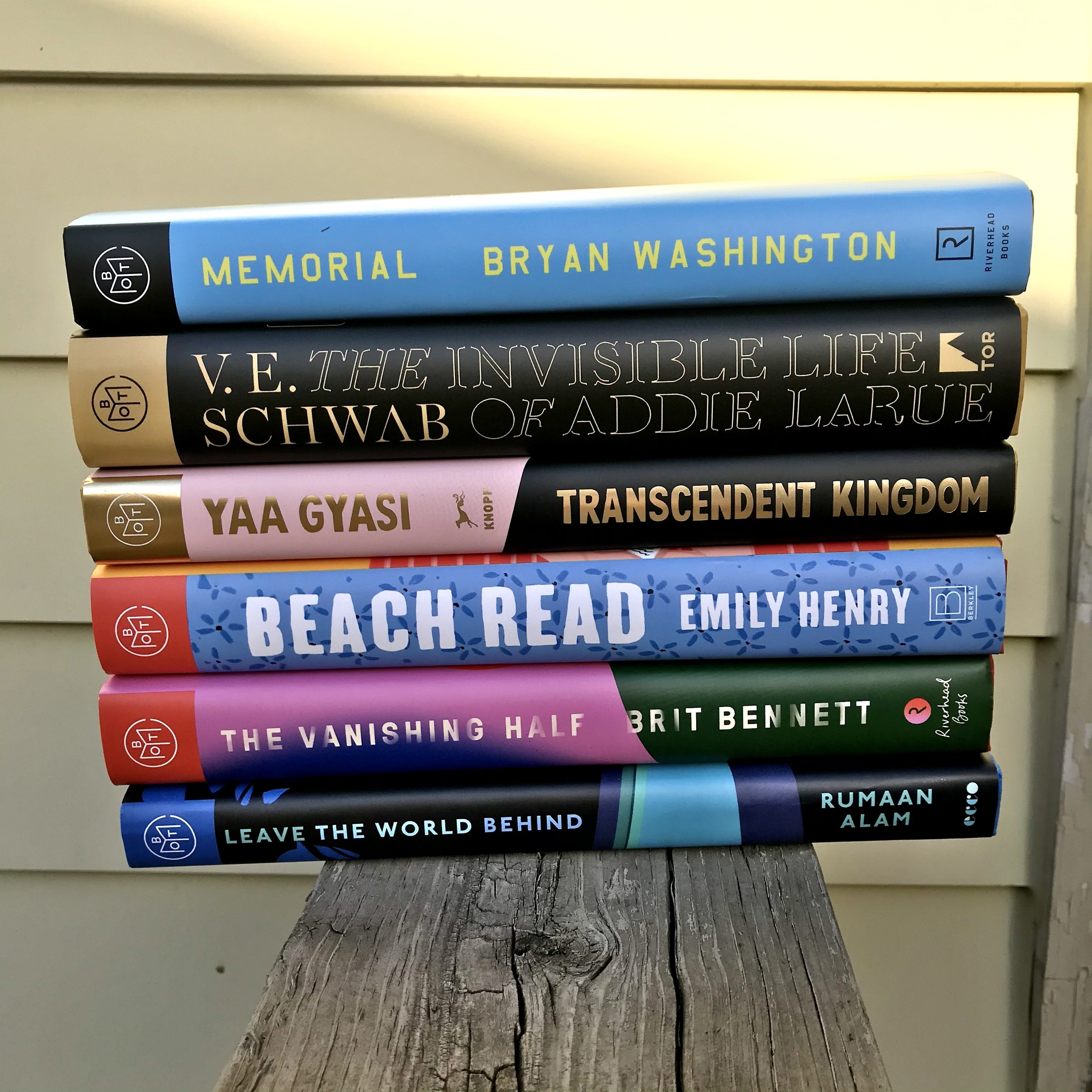 A stack of six different BOTM books the writer has received