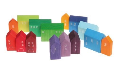 A set of brightly colored blocks that look like tiny houses