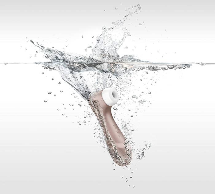 the satisfyer pro 2 being submerged in water