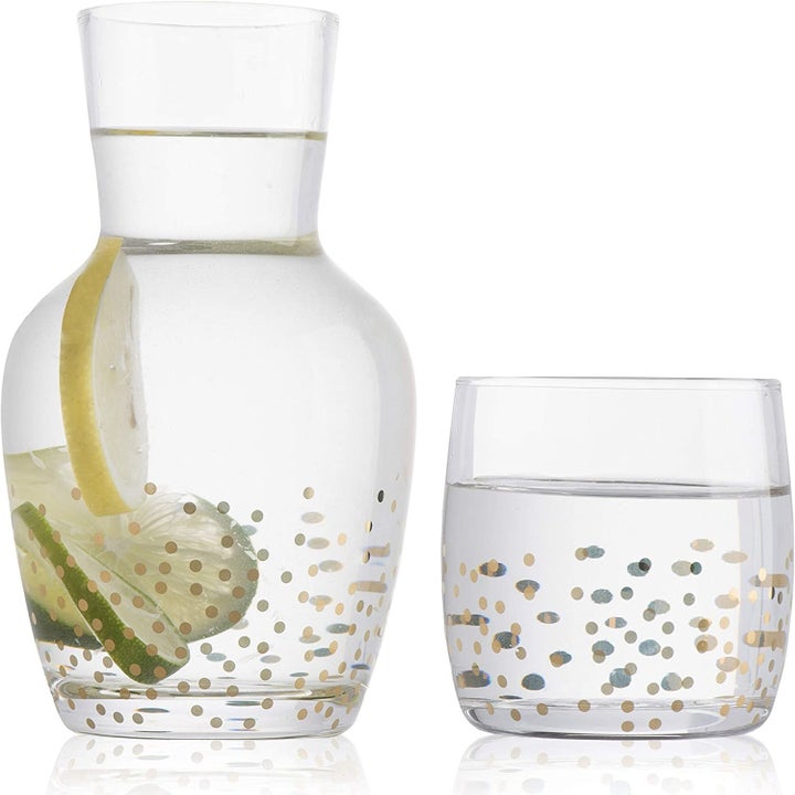 the carafe with the glass beside it