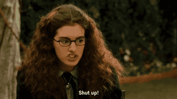 gif of Anne Hathaway in the movie &quot;The Princess Diaries&quot; saying &#x27;Shut up!&#x27;