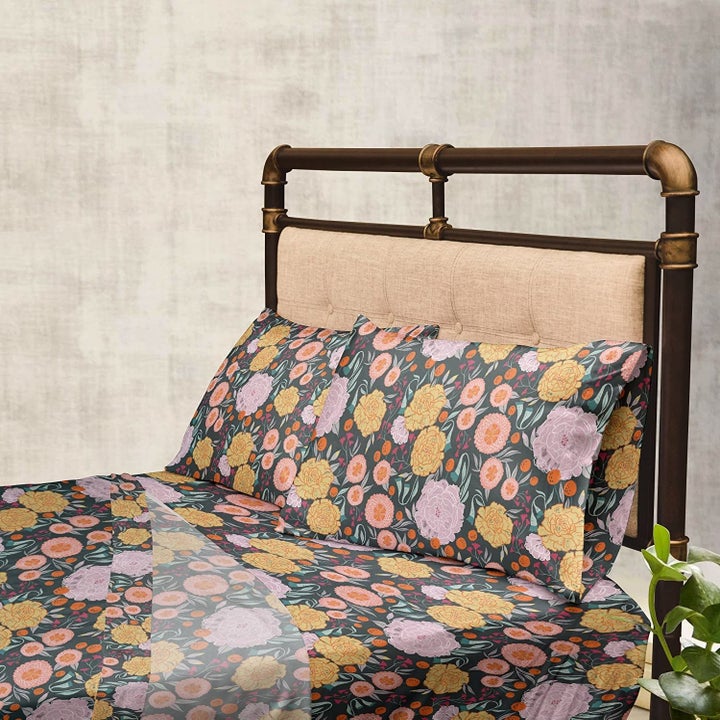 floral print sheets on a bed